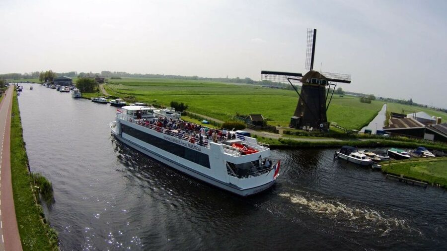 Amsterdam: Tour to Keukenhof Gardens with Windmill Cruise - Returning to Amsterdam when you are ready