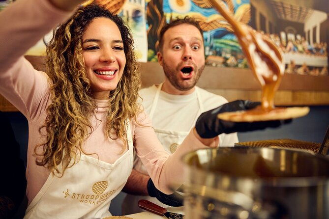 Amsterdam Traditional Dutch Syrup Waffle Making Workshop - Cooking two waffles on a hot iron