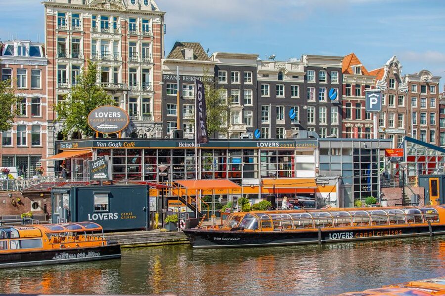Amsterdam: Van Gogh Museum Ticket & Canal Cruise - Entering the Van Gogh Museum at Museumplein