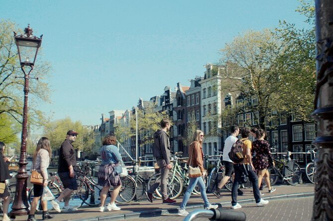 Anne Frank's Last Walk & See Anne Frank House in Virtual Reality - Starting at Max Euweplein beside the chess champion