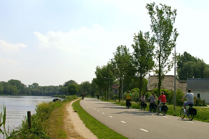 Countryside Bike Tour from Amsterdam: Cheese, Clogs & a Windmill - Waterland’s open fields and quiet cycle paths