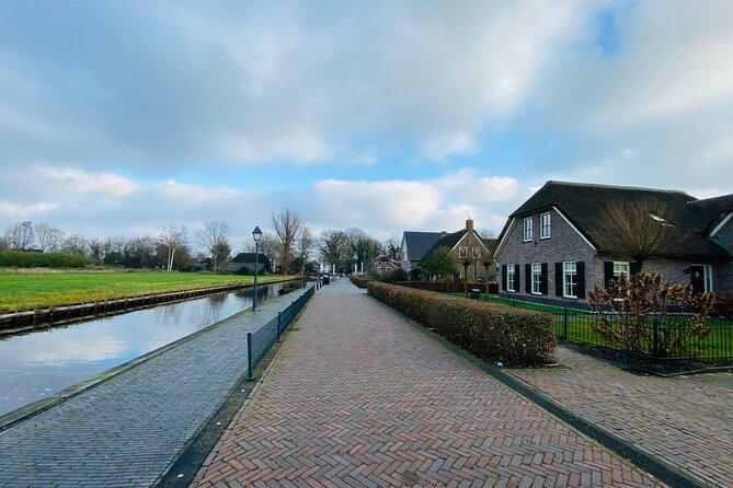 Day Tour Giethoorn, Afsluitdijk and Zaanse Schans with Boat Cruise - Transport, pickup, and the feel of a small group