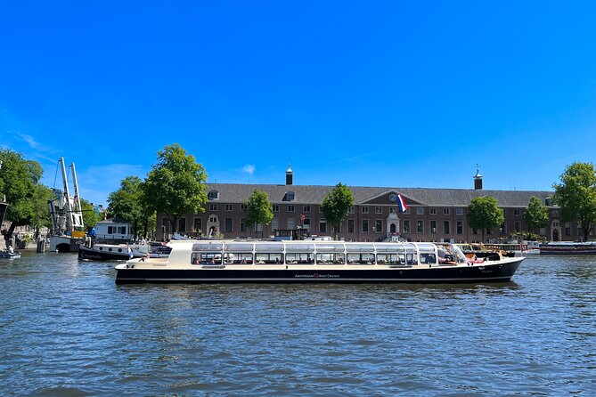 Discover Amsterdam: Luxury Canal Cruise with a Local Skipper - Live commentary, audio information, and the sound problem