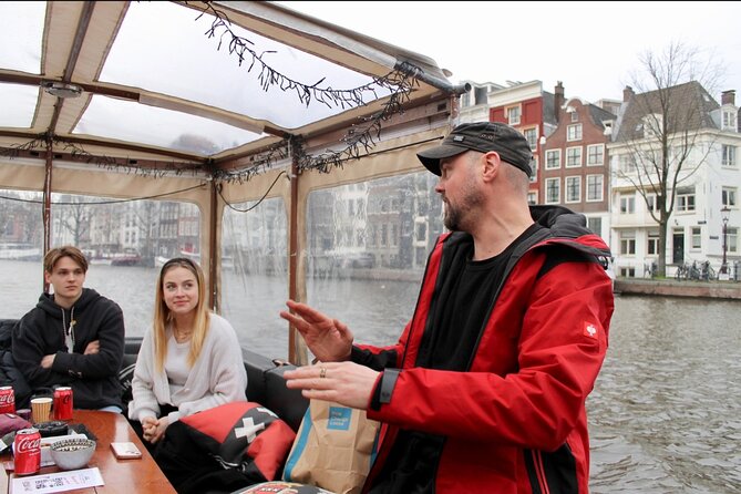 Dutch Cheese & Drinks Guided Amsterdam Boat Tour, All Inclusive - A cheese plate with a front-row view of Amsterdam