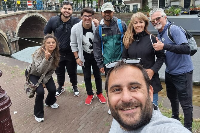 E-Bike Tour, Amsterdam's Highlights and Hidden Gems - The Magere Brug and houseboat views