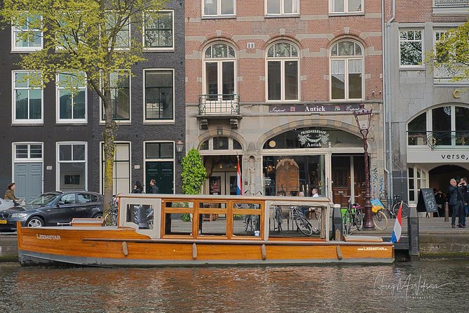 Exclusive Cruise! 90 min - 12 guests max - Book Leemstar! - Drinks, Dutch bites, and evening atmosphere