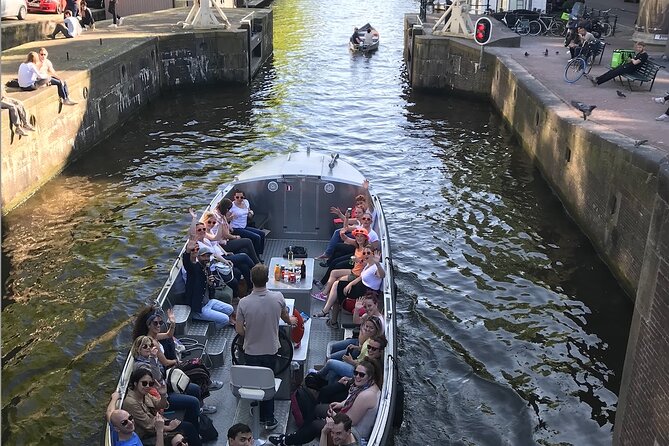 Explore Amsterdam by Bike in the Company of a French Local Guide - Begijnhof: a quiet courtyard in the center