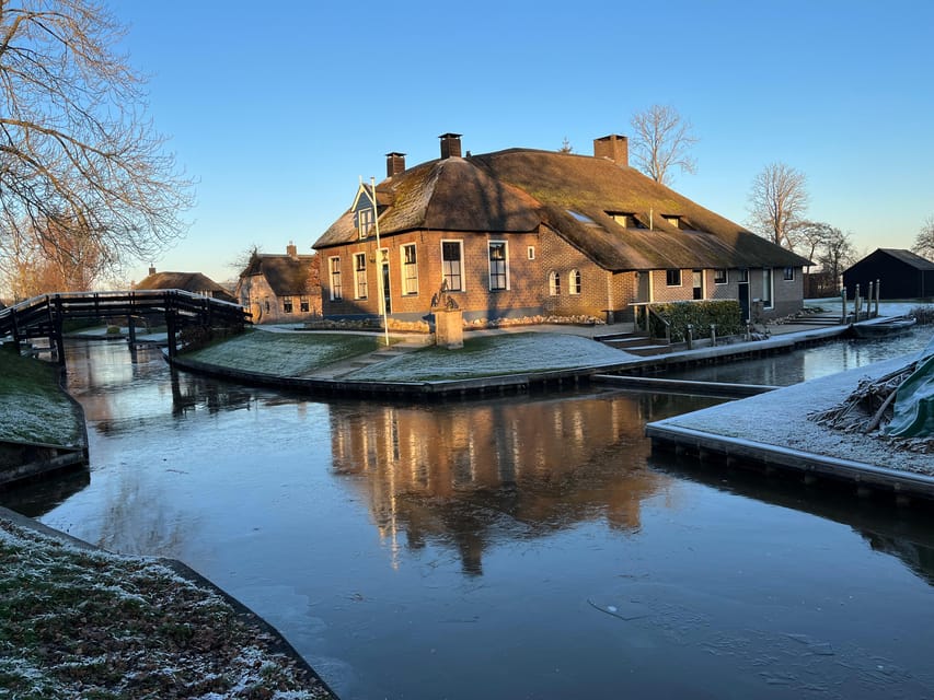 From Amsterdam: Giethoorn Small Group Tour with Boat Ride - The small boat through Giethoorn