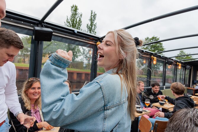 Groningen: Terrace Boat Experience with a Cozy Bar: 1 hour - The Groningen Museum from the water