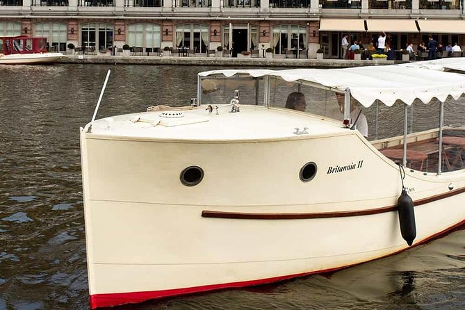 Guided Amsterdam Canal Cruise – Snacks & Drinks on board(1 Hour) - The ship-shaped building and skyline views
