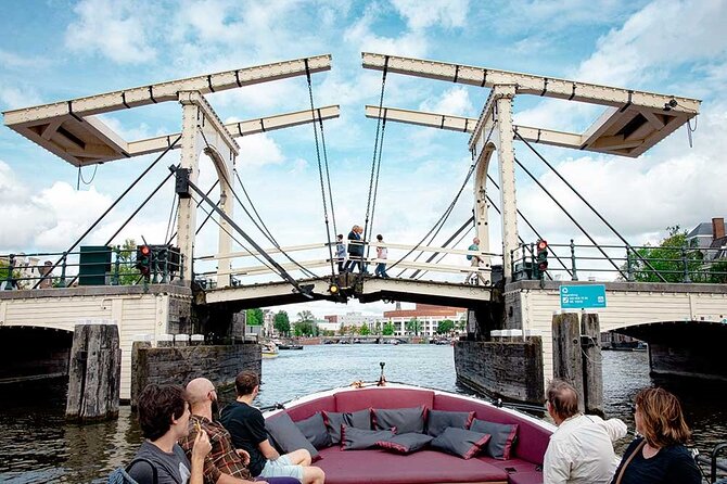 Guided Amsterdam Canal Cruise – Snacks & Drinks on board(1 Hour) - A green view from the canal