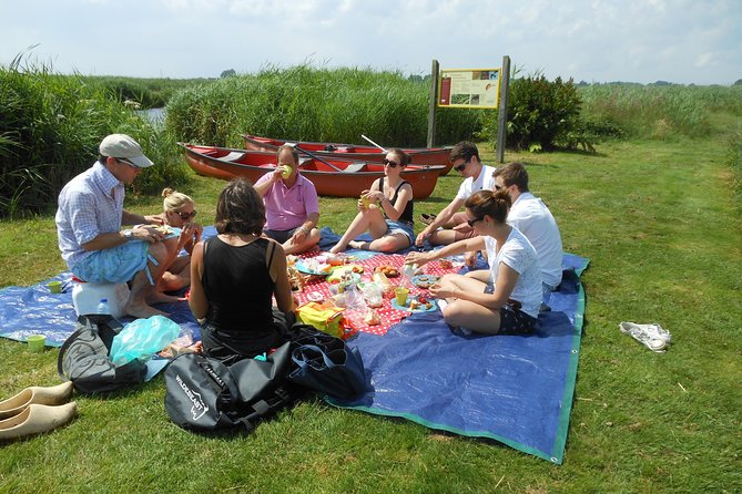 Guided Canoe Adventure with Picnic Lunch in Waterland from Amsterdam - Paddling the canals in a shared canoe