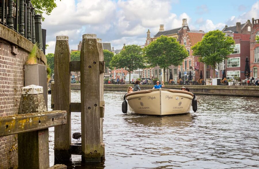 Haarlem: De Adriaan Windmill Tour + Open Canal Cruise - Boarding the open electric sloop