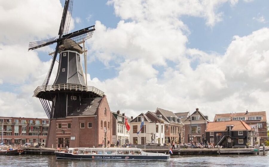 Haarlem: Dutch Windmill & Spaarne River Sightseeing Cruise - Covered boats make the cruise a year-round option