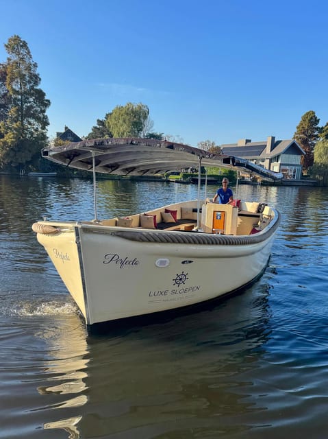 Haarlem: Guided Highlights Canal Cruise on Open Boat - Teylers Museum brings the cruise back toward the center