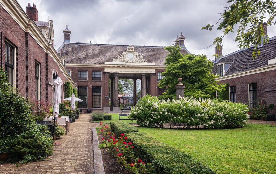Haarlem Highlights Bike Tour - Churches, Canals, and Windmills Along the Way
