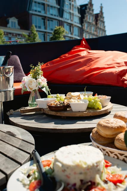 Haarlem: Sightseeing Boat Tour with Snacks and Drinks - Boarding at Nieuwe Gracht 80