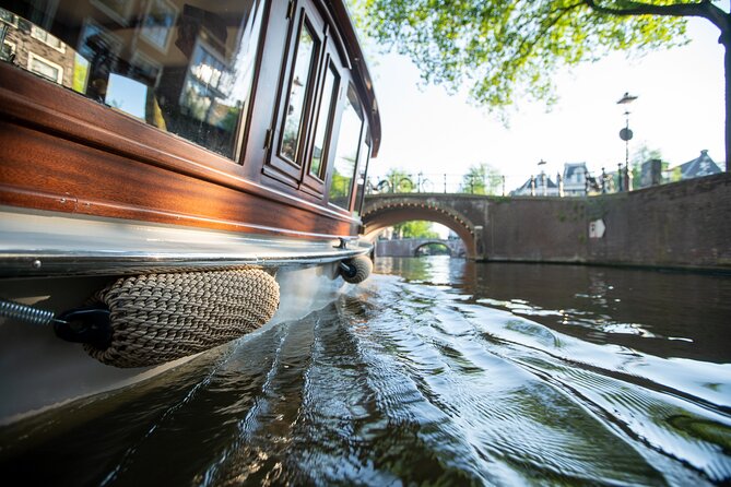 Private Boat Tour Amsterdam - 90 Min incl. welcome drink on historic saloon boat - Weather, cancellation, and practical planning