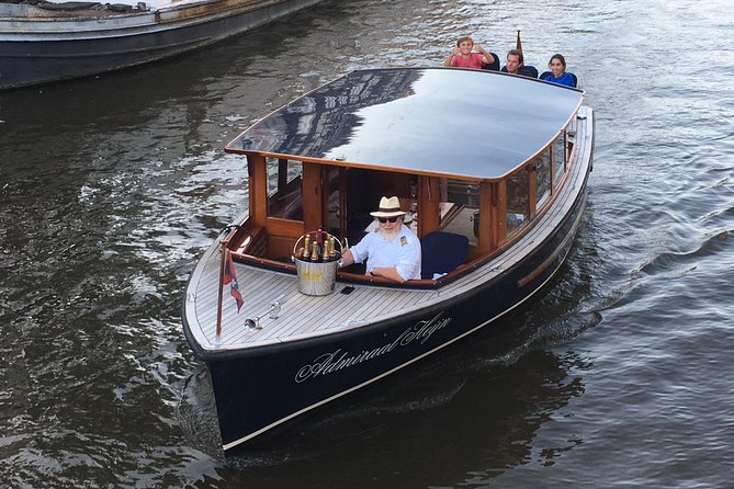 Private boat tour on a electric saloon boat - Seeing Amsterdam from a quiet electric boat