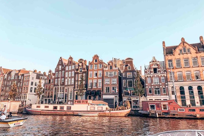 Private Romantic Canal Cruise Amsterdam with Bubbly and Snacks - Seven Bridges, old canals, and the Amstel