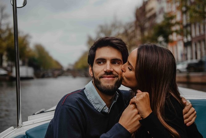 Private Romantic Canal Cruise Amsterdam with Bubbly and Snacks - Romantic bridges and stories worth hearing