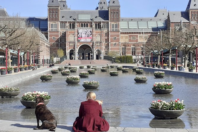 Private Tour: Amsterdam City Walking Tour and Canal Cruise - Seeing Amsterdam from a glass-roofed canal boat