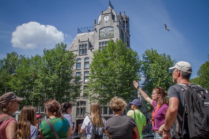 Secrets of Amsterdam Walking Tour plus Dutch Sweets Tasting - A quiet pause inside the Begijnhof