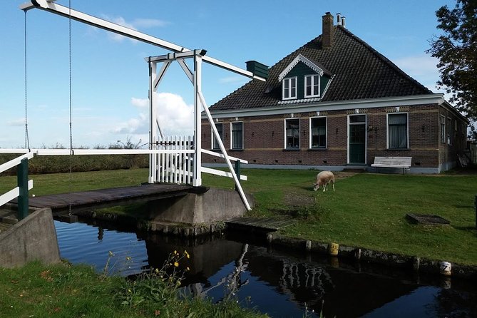 Small-Group Guided Sunset Canoe Tour in Waterland with Dinner - Sunset, windmills, and the weather gamble
