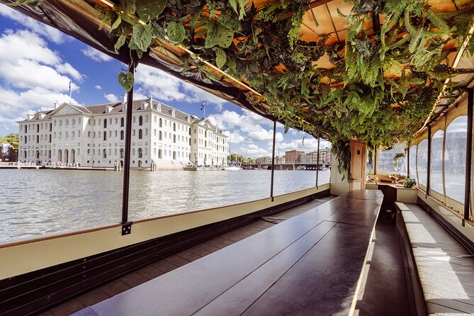 Small-Group Luxury Canal Cruise with Local Skipper - Crooked houses near the Amstel