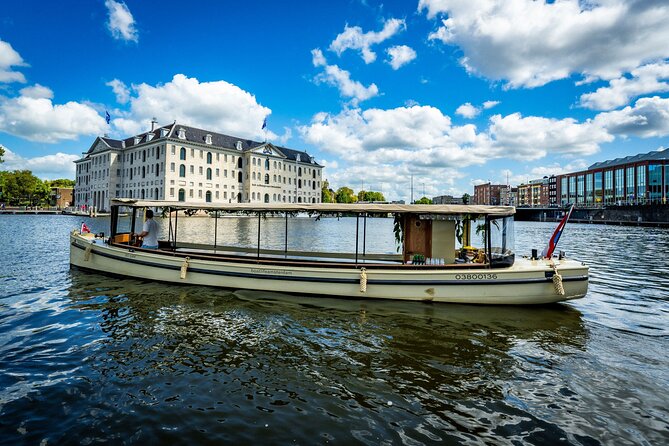 Small-Group Luxury Canal Cruise with Local Skipper - Historic canal houses and the 17th-century city