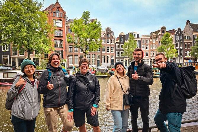 Small Group Walking Tour - Hello Amsterdam - Damrak: dancing houses and a playful fact check