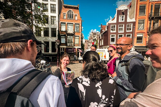 Small Group Walking Tour - Hello Amsterdam - Haarlemmersluis: learning the rules of Amsterdam’s bike culture