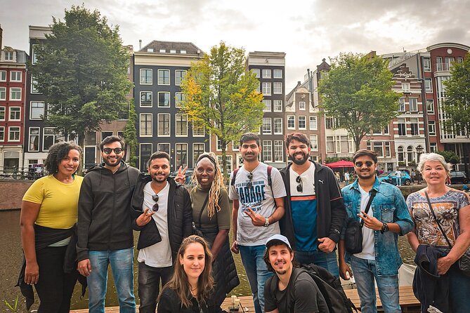 Small Group Walking Tour - Hello Amsterdam - Dam Square and Damstraat: Amsterdam’s main stage