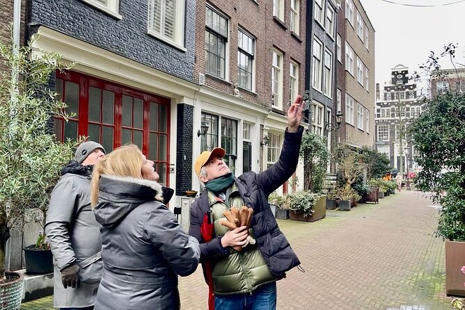 Small Group Walking Tour in Amsterdam with Friendly and Fun Guide - An hour with Amsterdam’s famous canals