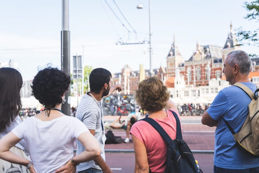 Small-Group Walking Tour with Amsterdam Canal Cruise - Beursplein begins the story in central Amsterdam