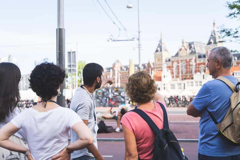 Small-Group Walking Tour with Amsterdam Canal Cruise - Dam Square brings power and tragedy together