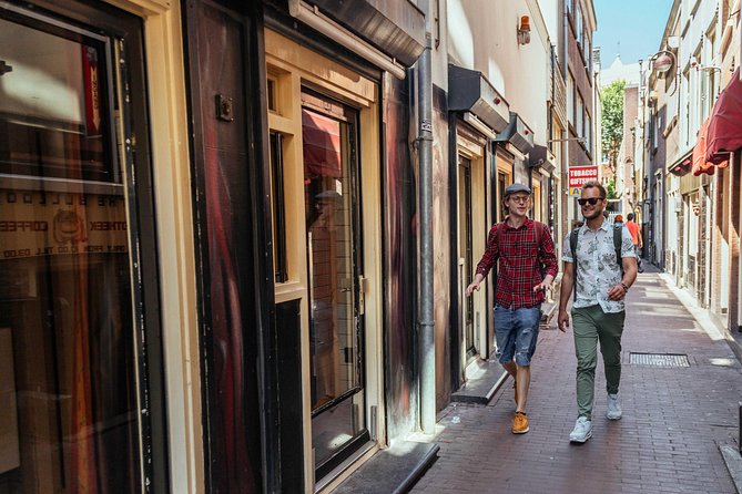 Treasures of Amsterdam: Coffeeshops & Red Light District Private Tour - Zeedijk, Chinatown, and the old center