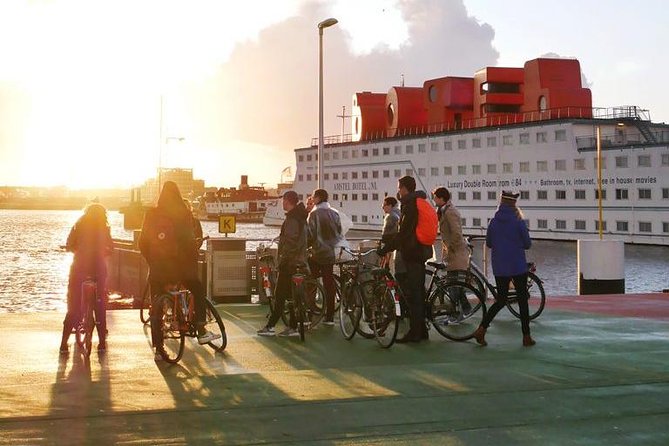 Urban Adventures Amsterdam Bike Tour, Graffiti and Magnet Fishing - The ferry turns the IJ into part of the tour
