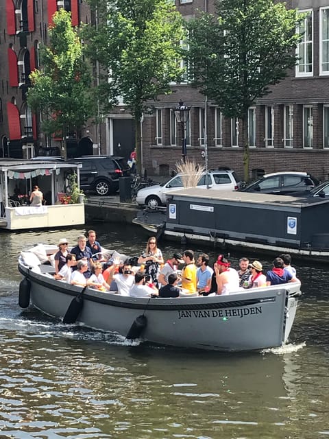 Visit Amsterdam by Boat with a French Guide (french) - Meeting the boat near Amsterdam Centraal