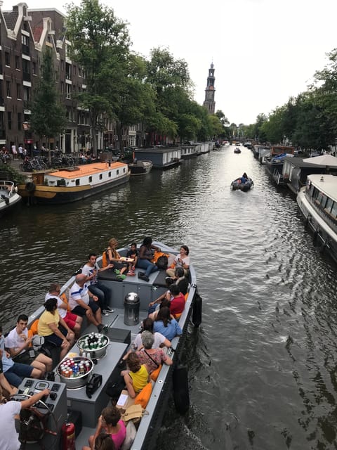 Visit Amsterdam by Boat with a French Guide (french) - De Negen Straatjes and the Anne Frank House