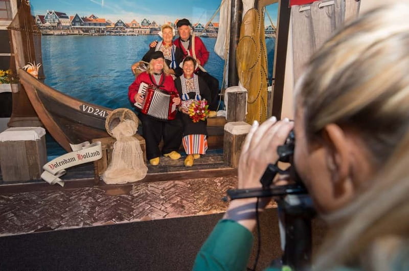 Volendam: Photo Opportunity in Traditional Dutch Costume - The dressing process and the photo setup