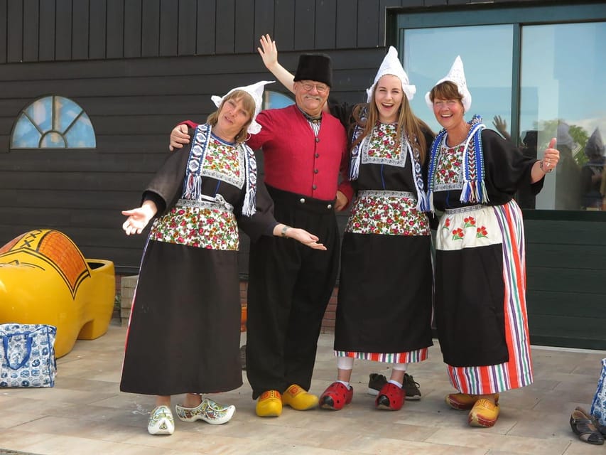 Volendam: Traditional Costume Photo with Cheese & Clog Tour - Seeing a clog take shape from wood