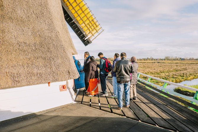 Windmill Tour from Amsterdam, Including Volendam & Marken - Volendam: harbor views, cheese, and a commercial stop
